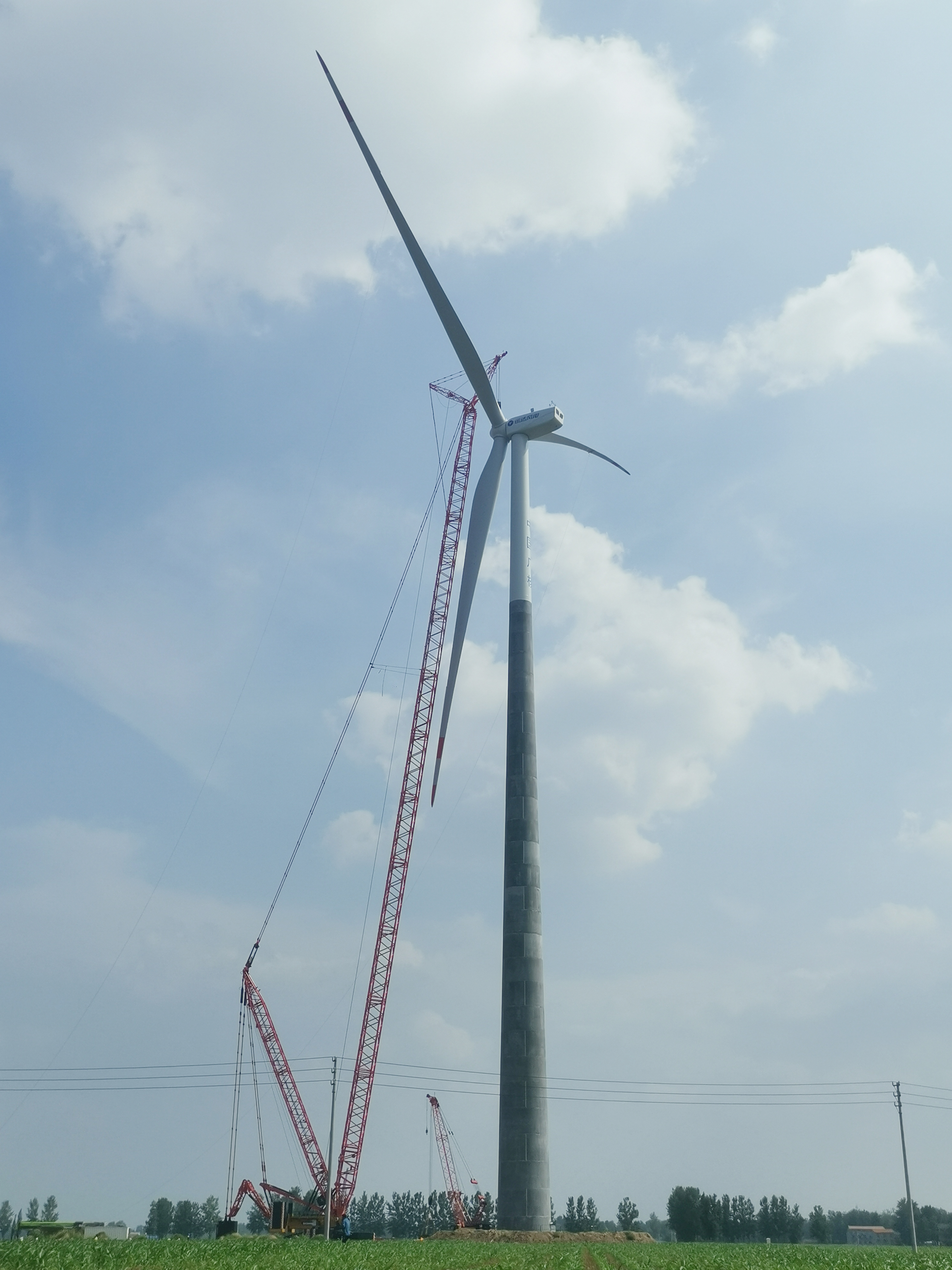 公司首台！！！150米混塔机组顺遂并网